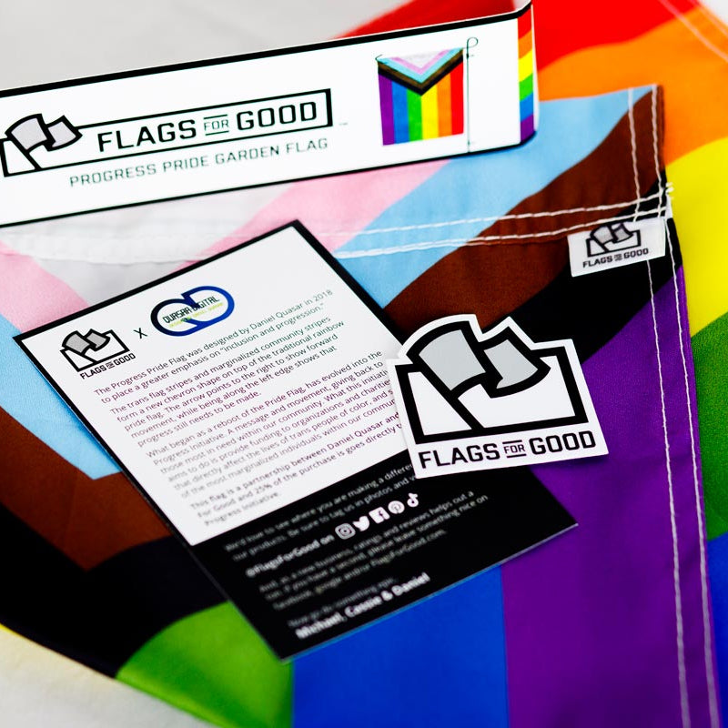Packaging of a rainbow flag with 'Flags For Good' branding on a white background