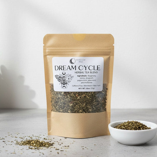Dream Cycle herbal tea blend package with a small bowl of tea leaves on a light background