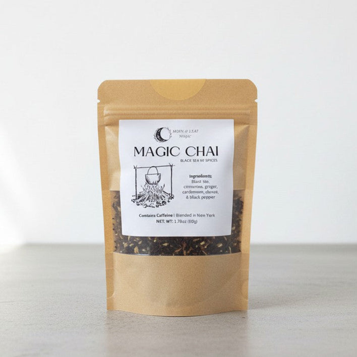 Bag of Magic Chai tea on a white surface with a light background